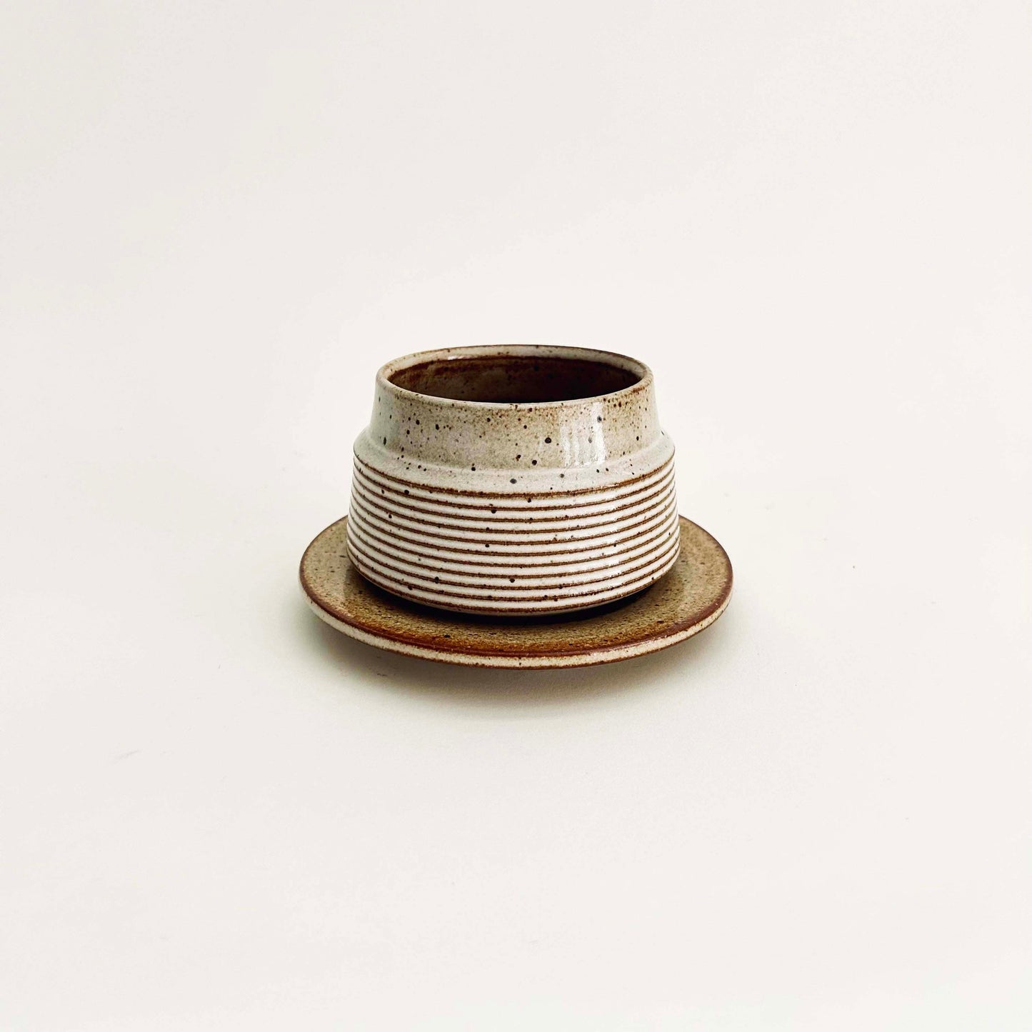 Tapered Textured Cup and Saucer Set in Warm White