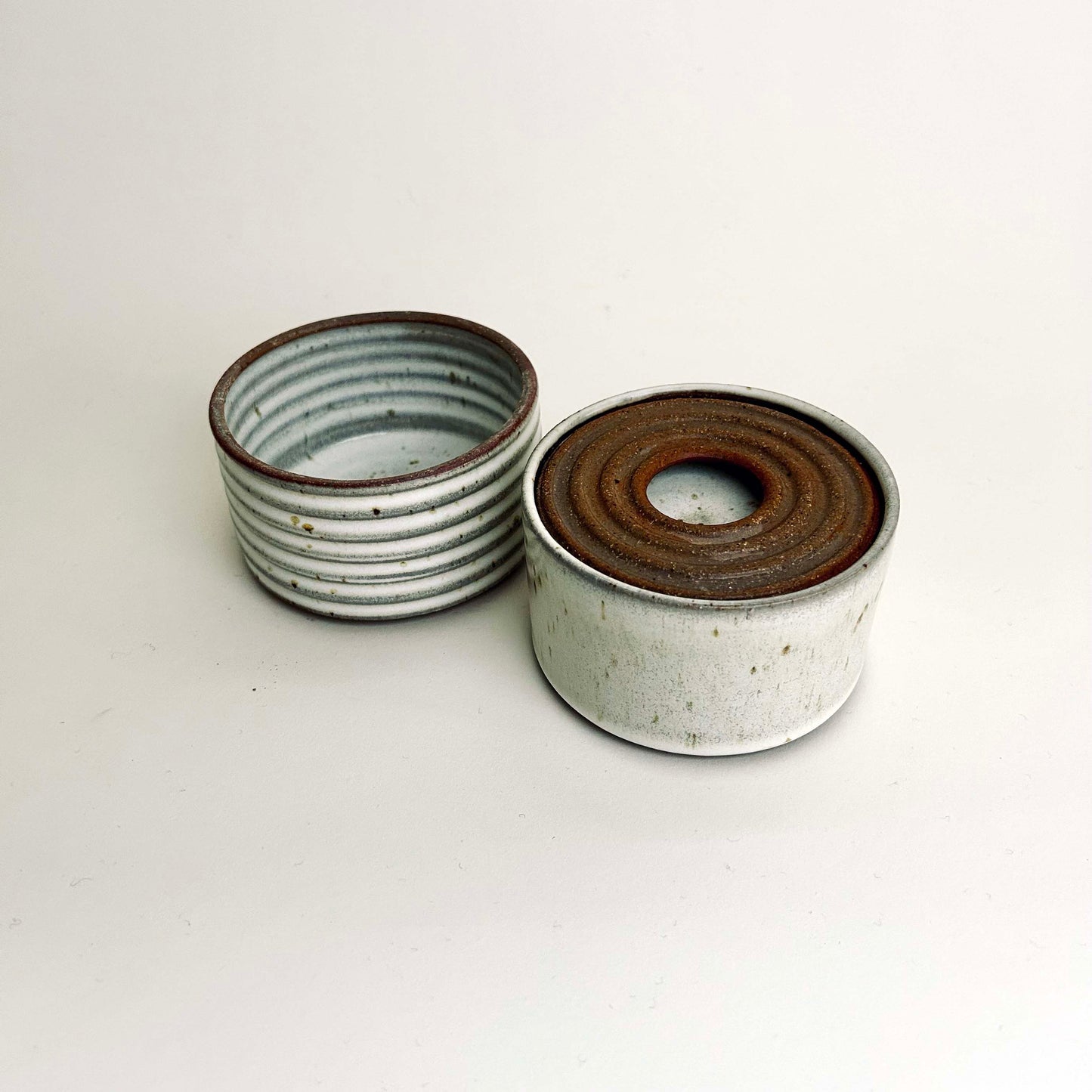 Two-Tiered Cylindrical Ribbed Lidded Container in Buttermilk