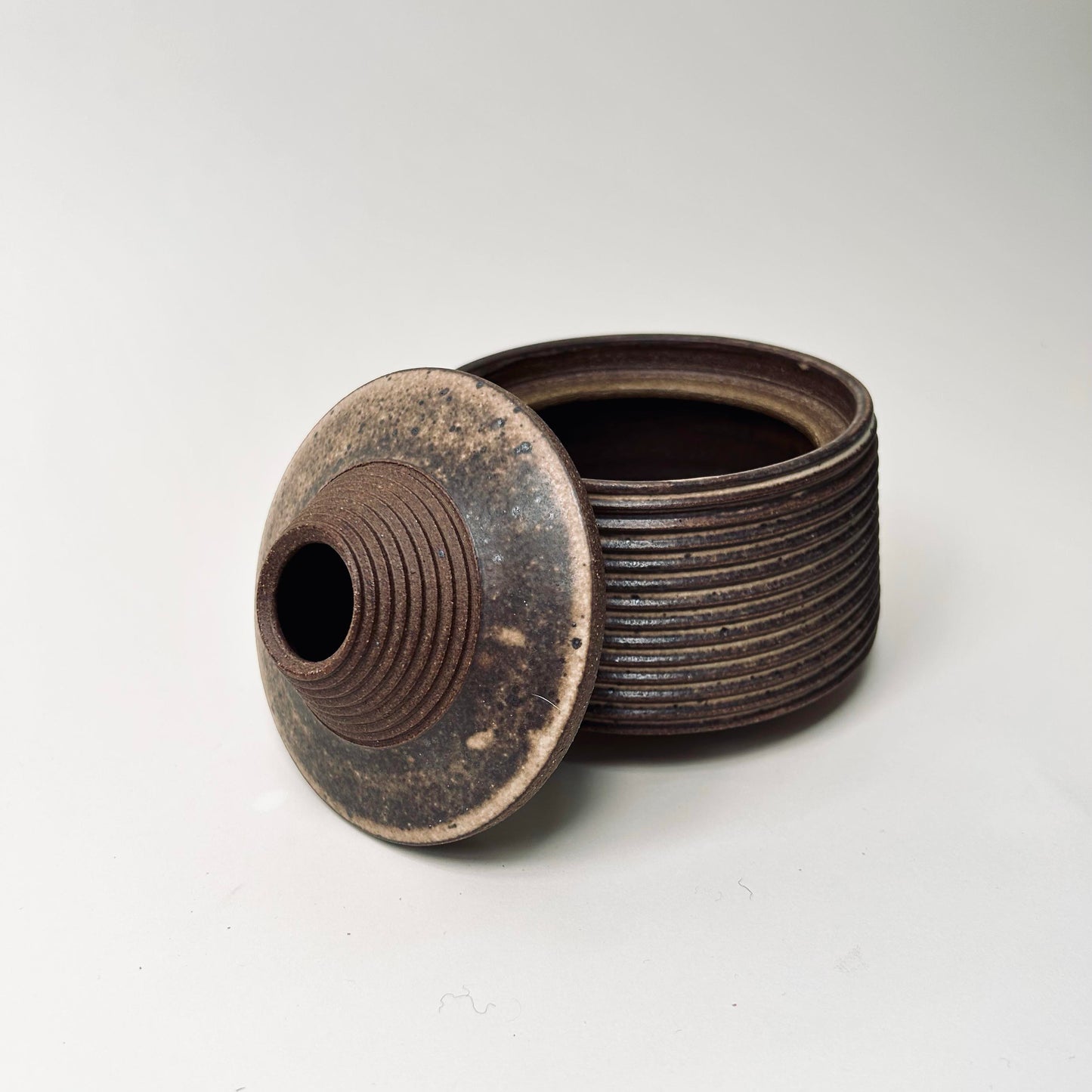 Tapered Lidded Vessel in Warm Brown